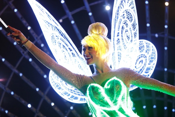 TINKER BELL LIGHTS THE WAY IN 'PAINT THE NIGHT' (ANAHEIM, Calif.)ÑTinker Bell gathers all of her pixie dust to paint the night in dazzling Disney dreams in this all-new new after-dark spectacular at Disneyland park inspired by the iconic 'Main Street Electrical Parade.' 'Paint the Night' is full of vibrant color and more than 1.5 million, brilliant LED lights and features special effects, unforgettable music, and energetic performances that bring beloved Disney stories to life. Celebrating 60 years of magic, 'Paint the Night' is one of three new nighttime spectaculars which will immerse guests in the worlds of Disney stories like never before. The Diamond Celebration at the Disneyland Resort begins Friday, May 22, 2015. (Disneyland Resort)