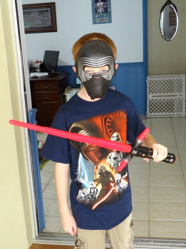 Dressed up as Kylo Ren with Mask and Lightsaber from Kohl's